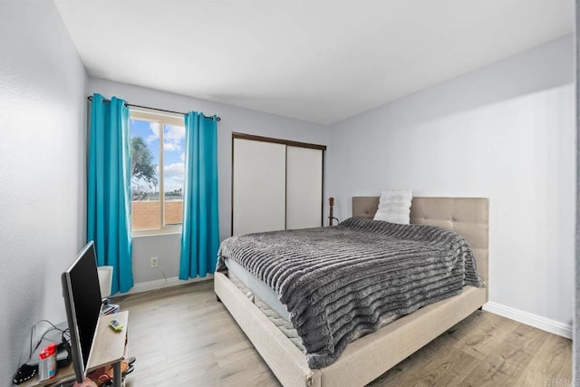 1380 E Washington Ave Unit 2, El Cajon, CA 92019 - bedroom with wood finished floors and a closet