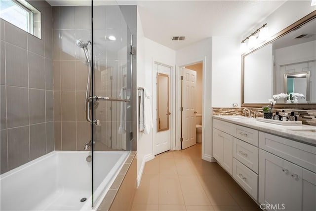 1803 Chambers Ct, Fullerton, CA 92833 - full bathroom with double vanity, toilet, tile patterned flooring, and tiled shower / bath combo
