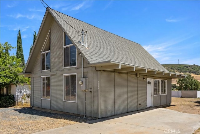 3996 Leonore Ave, Clearlake, CA 95422 - back of house with roof with shingles and a patio area