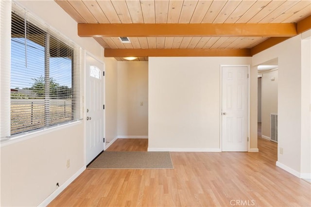 3996 Leonore Ave, Clearlake, CA 95422 - foyer featuring light wood finished floors, baseboards, and wooden ceiling with exposed beams
