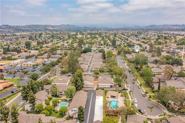 338 E Palmdale Ave Unit 4, Orange, CA 92865 - view of property location featuring nearby suburban area, a pool area, and a mountain backdrop