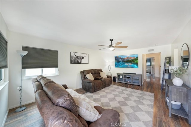 338 E Palmdale Ave Unit 4, Orange, CA 92865 - living area featuring ceiling fan, wood finished floors, and baseboards