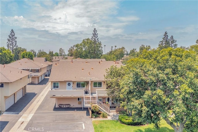 338 E Palmdale Ave Unit 4, Orange, CA 92865 - view of front of home with stairway and stucco siding