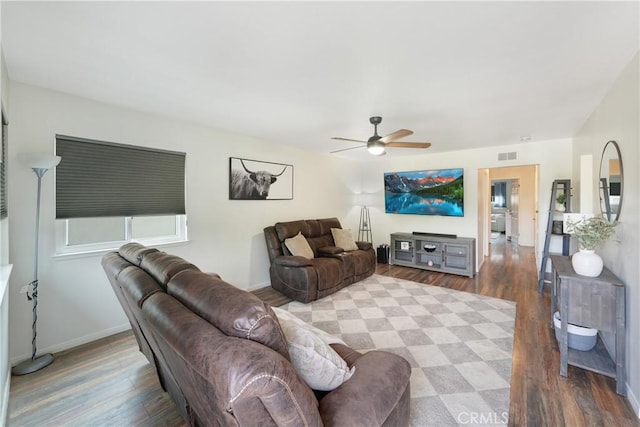 338 E Palmdale Ave Unit 4, Orange, CA 92865 - living area featuring wood finished floors, a ceiling fan, and baseboards
