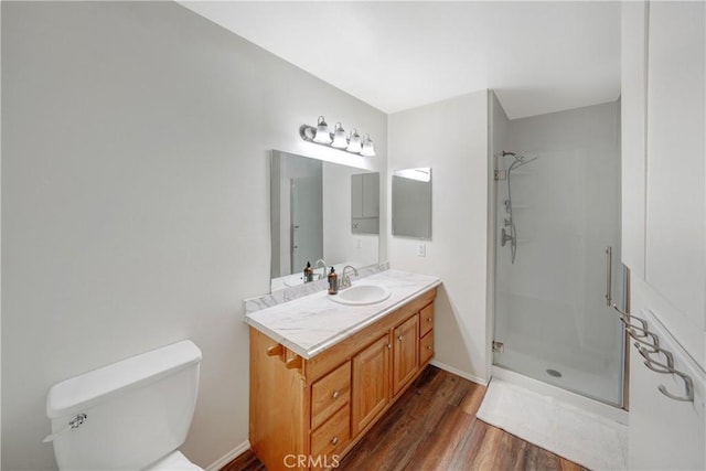 338 E Palmdale Ave Unit 4, Orange, CA 92865 - full bath with vanity, a walk in shower, wood finished floors, and toilet