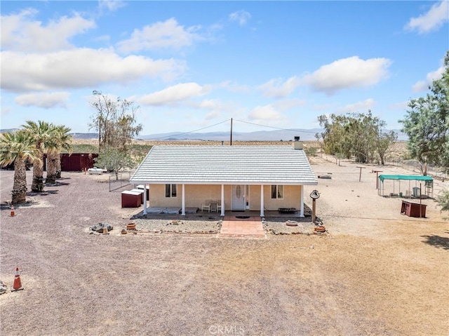 49333 Riverside Rd, Newberry Springs, CA 92365 - rear view of property with a tile roof and covered porch
