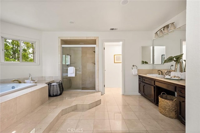 32022 Via Pavo Real, Coto De Caza, CA 92679 - full bath with vanity, a stall shower, a bath, tile patterned floors, and baseboards