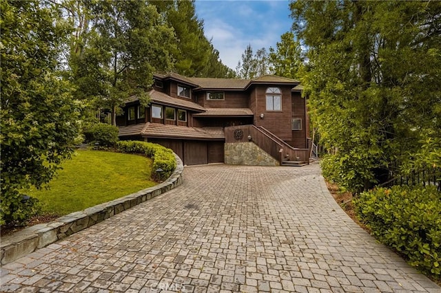 32022 Via Pavo Real, Coto De Caza, CA 92679 - view of front facade featuring decorative driveway, a garage, and a front lawn