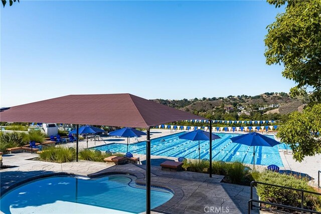 32022 Via Pavo Real, Coto De Caza, CA 92679 - community pool featuring a patio area