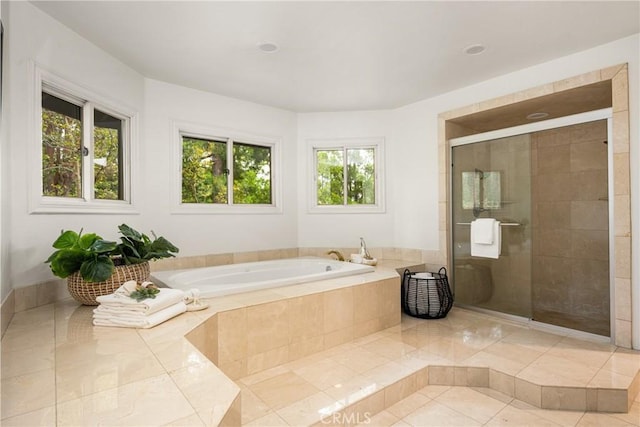 32022 Via Pavo Real, Coto De Caza, CA 92679 - bathroom featuring a garden tub, tiled shower, and tile patterned flooring