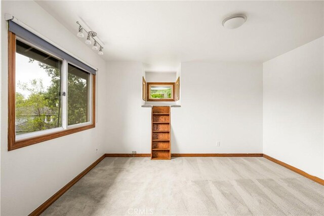 32022 Via Pavo Real, Coto De Caza, CA 92679 - spare room featuring light colored carpet and baseboards