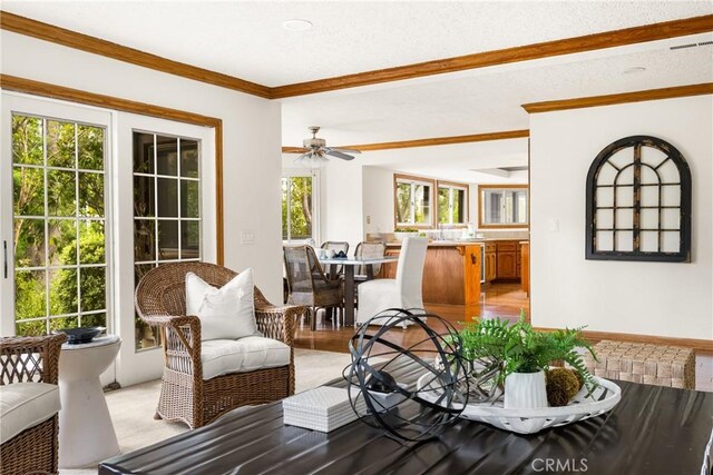 32022 Via Pavo Real, Coto De Caza, CA 92679 - dining room with a ceiling fan, ornamental molding, and light wood-style flooring
