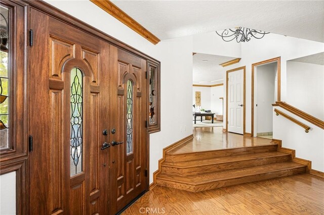 32022 Via Pavo Real, Coto De Caza, CA 92679 - entrance foyer with light wood finished floors, baseboards, and stairway