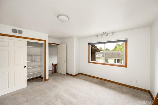 32022 Via Pavo Real, Coto De Caza, CA 92679 - unfurnished bedroom featuring light colored carpet, baseboards, and a closet