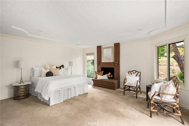 32022 Via Pavo Real, Coto De Caza, CA 92679 - carpeted bedroom featuring ornamental molding, baseboards, a textured ceiling, and a fireplace