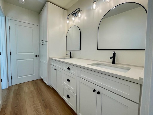 3972 Jackdaw St Unit 303, San Diego, CA 92103 - bathroom with double vanity and wood finished floors