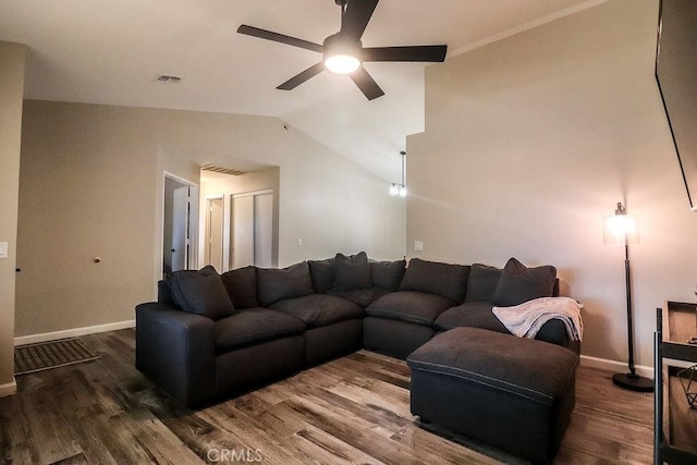 1330 Santa Fe Cir, Needles, CA 92363 - living room featuring a ceiling fan, vaulted ceiling, wood finished floors, and baseboards