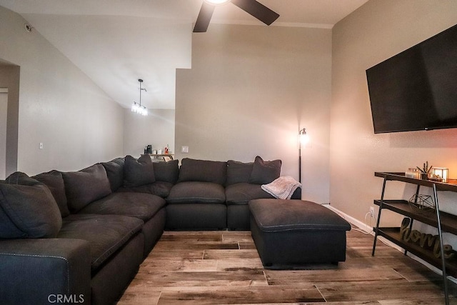 1330 Santa Fe Cir, Needles, CA 92363 - living area featuring a ceiling fan, wood finished floors, and lofted ceiling
