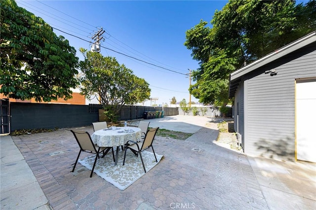 615 S Victoria Ave, Corona, CA 92879 - fenced backyard with a patio and outdoor dining area