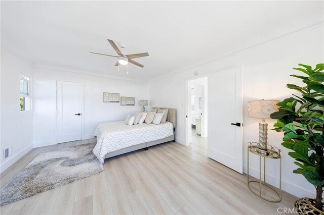 615 S Victoria Ave, Corona, CA 92879 - bedroom with light wood-style flooring, baseboards, and a ceiling fan