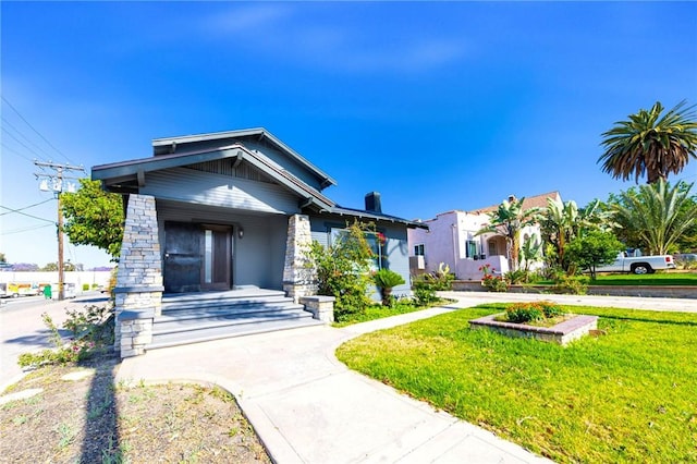 615 S Victoria Ave, Corona, CA 92879 - view of front of property featuring a front lawn and covered porch
