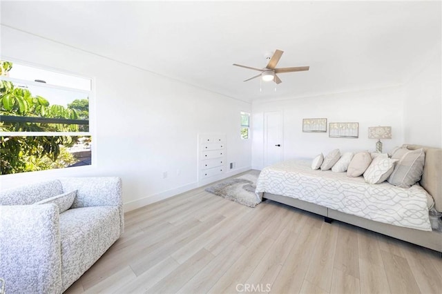615 S Victoria Ave, Corona, CA 92879 - bedroom featuring light wood-style floors, baseboards, and ceiling fan