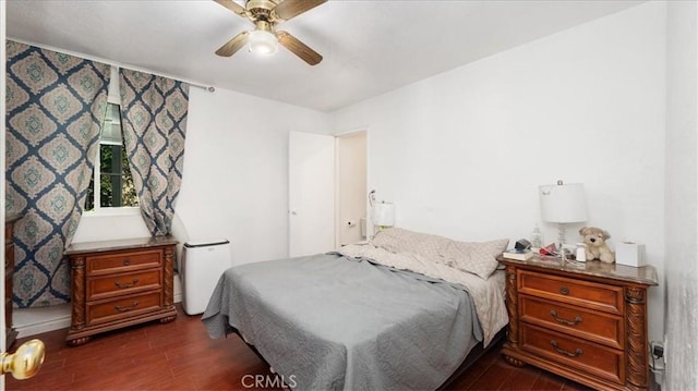 1373 W 5th St, San Bernardino, CA 92411 - bedroom featuring dark wood-type flooring and ceiling fan