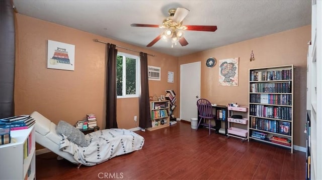 1373 W 5th St, San Bernardino, CA 92411 - living area featuring a ceiling fan, wood finished floors, baseboards, and a wall unit AC