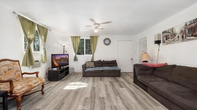 1373 W 5th St, San Bernardino, CA 92411 - living room with wood finished floors, ceiling fan, and cooling unit