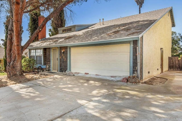 150 Richeth Rd, San Diego, CA 92114 - view of front of house featuring a garage, a chimney, stucco siding, and roof with shingles