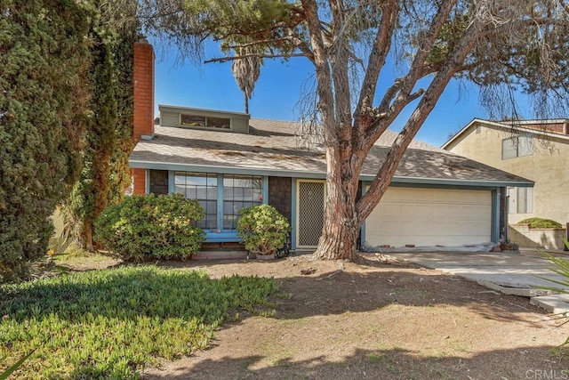 150 Richeth Rd, San Diego, CA 92114 - view of front of property featuring a garage, a chimney, driveway, and a shingled roof