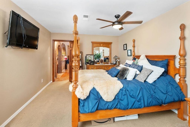 1663 Linda Sue Ln, Encinitas, CA 92024 - bedroom with light carpet, arched walkways, and a ceiling fan