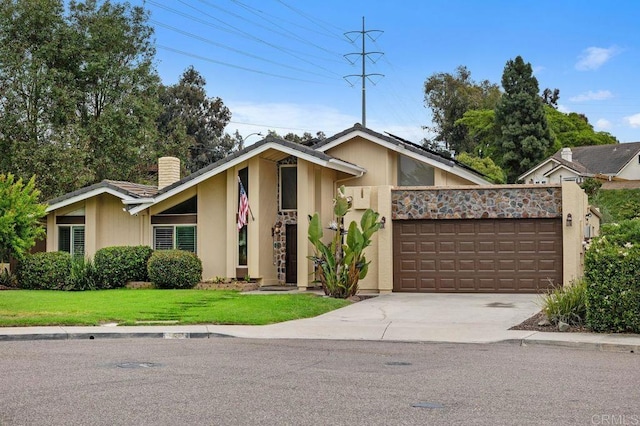 1663 Linda Sue Ln, Encinitas, CA 92024 - mid-century home featuring a chimney, concrete driveway, a garage, a front lawn, and stucco siding