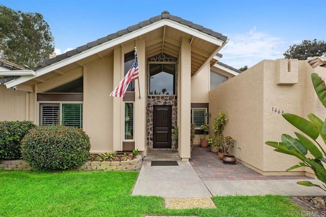1663 Linda Sue Ln, Encinitas, CA 92024 - doorway to property featuring a yard and stucco siding