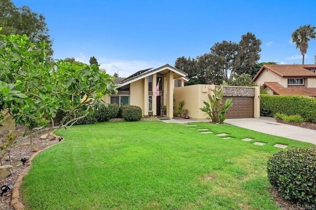 1663 Linda Sue Ln, Encinitas, CA 92024 - view of front of house with stucco siding, an attached garage, and concrete driveway