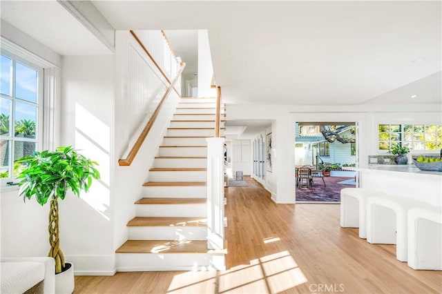 432 Holly St, Laguna Beach, CA 92651 - stairway featuring healthy amount of natural light, wood finished floors, and baseboards
