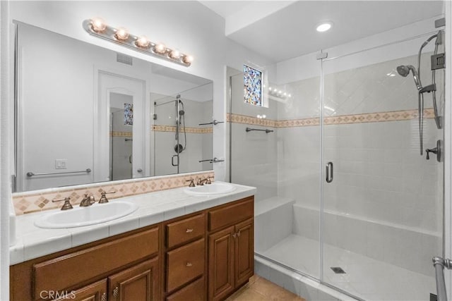 23795 Los Pinos Ct, Corona, CA 92883 - bathroom featuring a shower stall, double vanity, and tile patterned floors