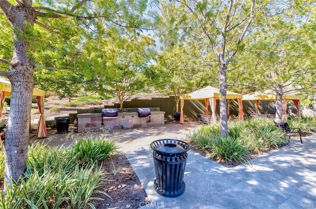 23795 Los Pinos Ct, Corona, CA 92883 - view of patio / terrace featuring a gazebo and an outdoor kitchen