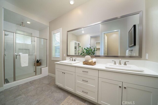 109 Pitch, Irvine, CA 92618 - bathroom featuring double vanity and a shower stall
