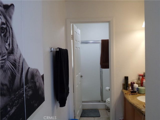 1598 Border Ave Unit H, Corona, CA 92882 - full bathroom featuring a stall shower, vanity, toilet, and tile patterned floors