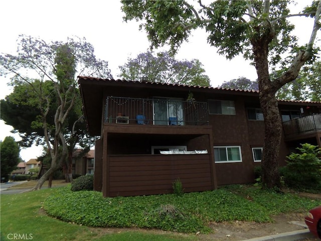 1598 Border Ave Unit H, Corona, CA 92882 - rear view of property featuring a balcony and stucco siding