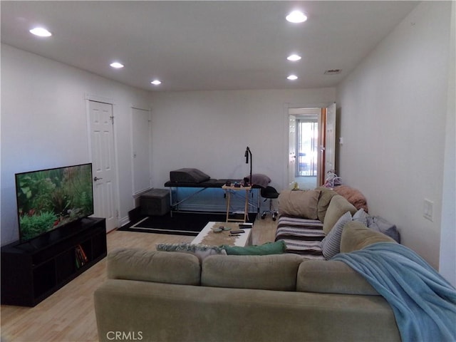 1598 Border Ave Unit H, Corona, CA 92882 - living room featuring light wood-style floors and recessed lighting