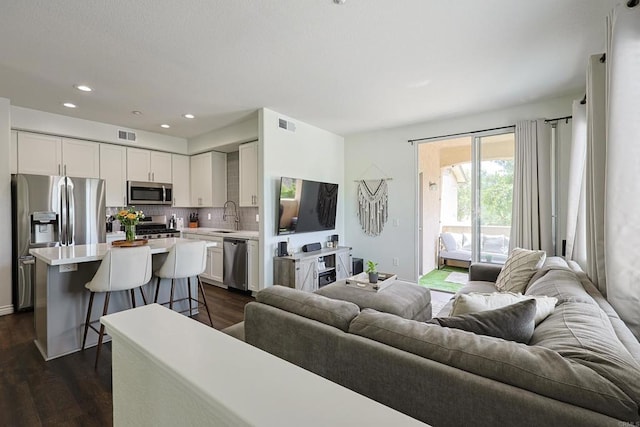3171 Dehesa Rd Unit 3, El Cajon, CA 92019 - living room with dark wood-style floors and recessed lighting