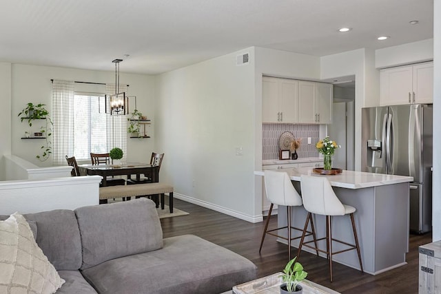 3171 Dehesa Rd Unit 3, El Cajon, CA 92019 - living area with dark wood-type flooring, a chandelier, recessed lighting, and baseboards