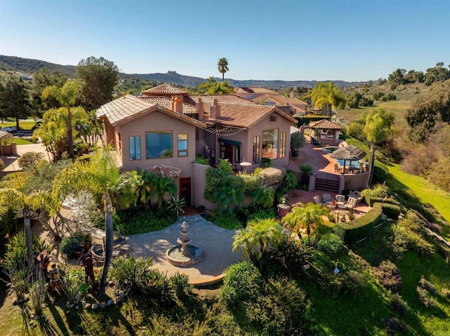 3198 Ashley Park Way, Jamul, CA 91935 - mediterranean / spanish house featuring stucco siding, a patio, a tiled roof, and a mountain view
