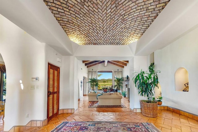 3198 Ashley Park Way, Jamul, CA 91935 - entrance foyer featuring arched walkways, baseboards, and brick ceiling