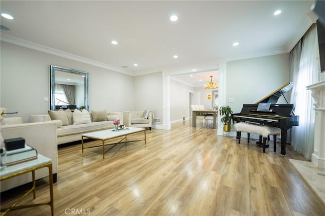 1281 E Orange Grove Blvd, Pasadena, CA 91104 - living room with light wood-style floors, recessed lighting, ornamental molding, baseboards, and a chandelier