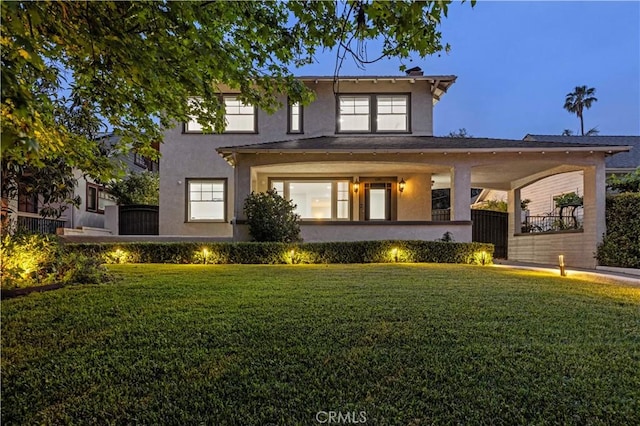 1281 E Orange Grove Blvd, Pasadena, CA 91104 - view of front of home with a front lawn, stucco siding, and a porch