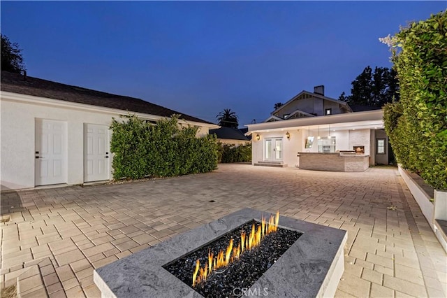 1281 E Orange Grove Blvd, Pasadena, CA 91104 - view of patio / terrace featuring an outdoor fire pit and area for grilling