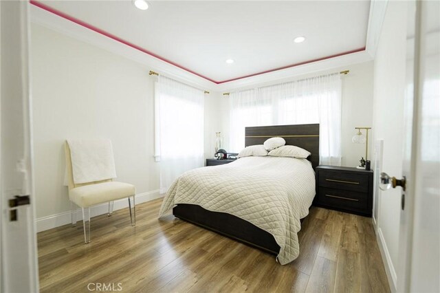1281 E Orange Grove Blvd, Pasadena, CA 91104 - bedroom with baseboards, wood finished floors, crown molding, and recessed lighting